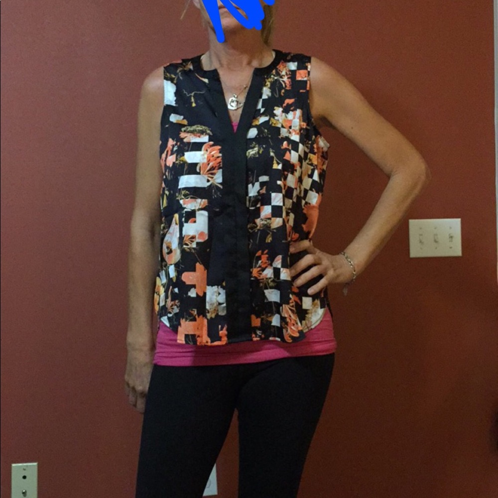 Black and orange sleeveless v neck blouse